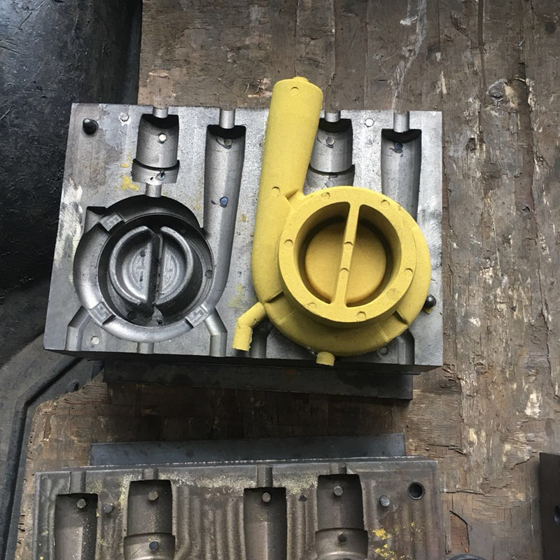 How to prevent porosity defects caused by increased humidity during the production of castings using coated sand technology in summer?