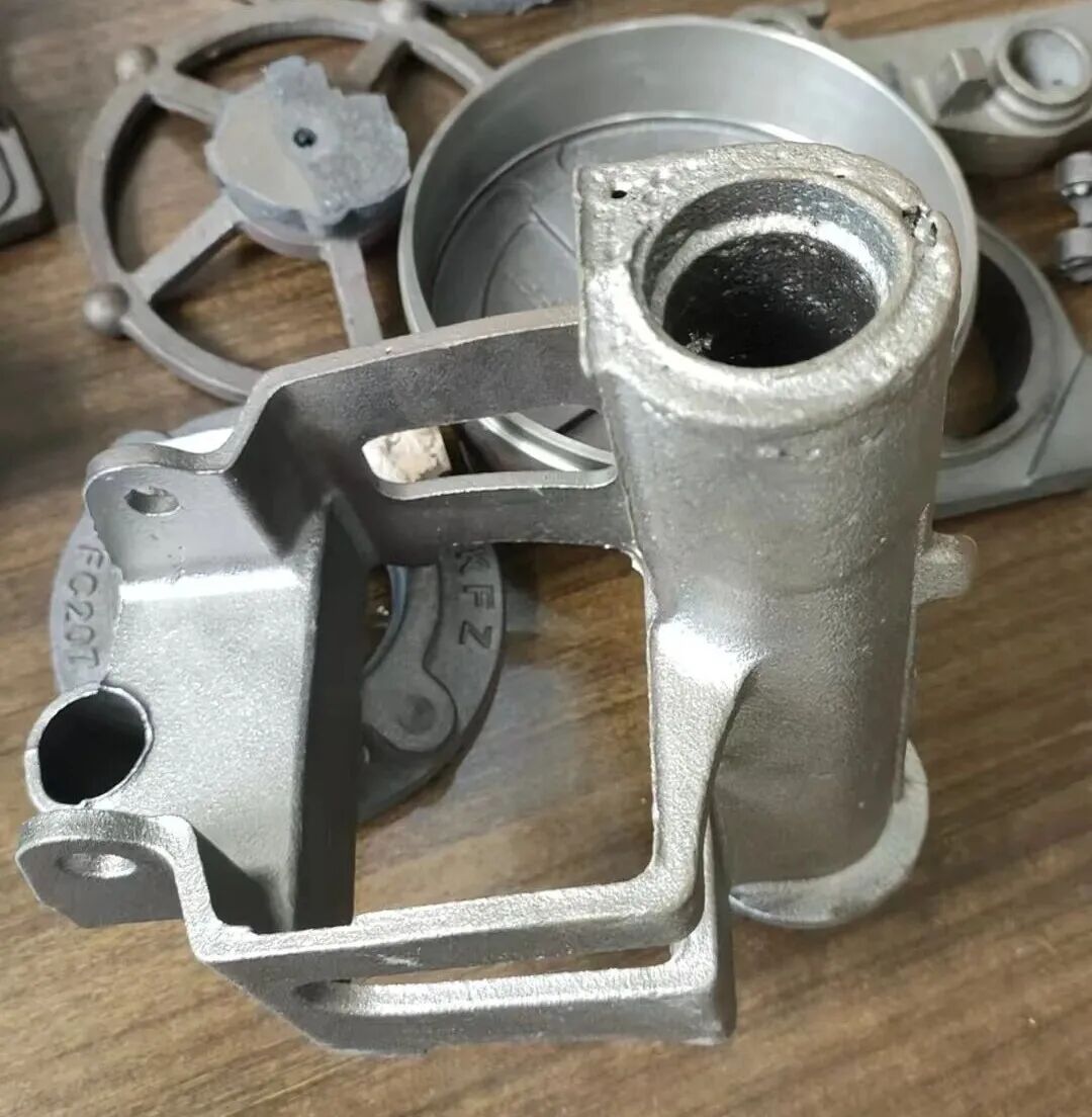 Treatment for severe porosity in cylindrical tubular sand cores during the production of ductile iron parts using green sand molding technology